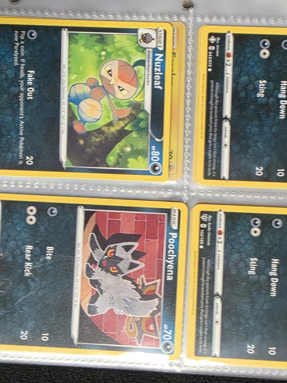 Pokemon Red and Blue Pokemon Card Binder And 53 Pokemon Cards.